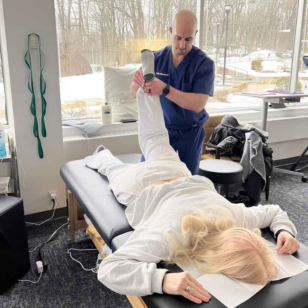 Patient receiving physical therapy from Dr. Niko at Atlas Peak in Pleasantville NY
